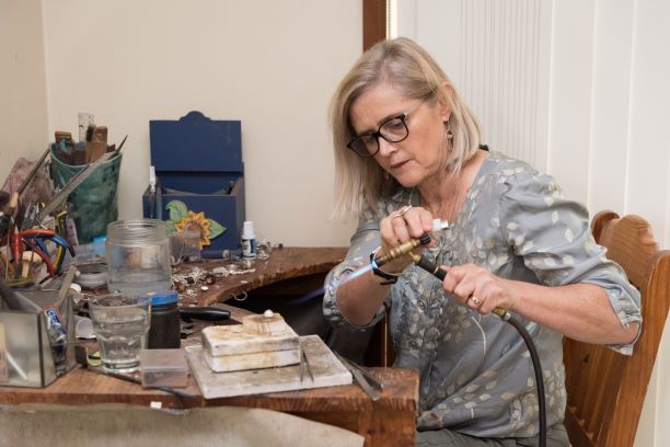 Elizabeth Rose working in the studio